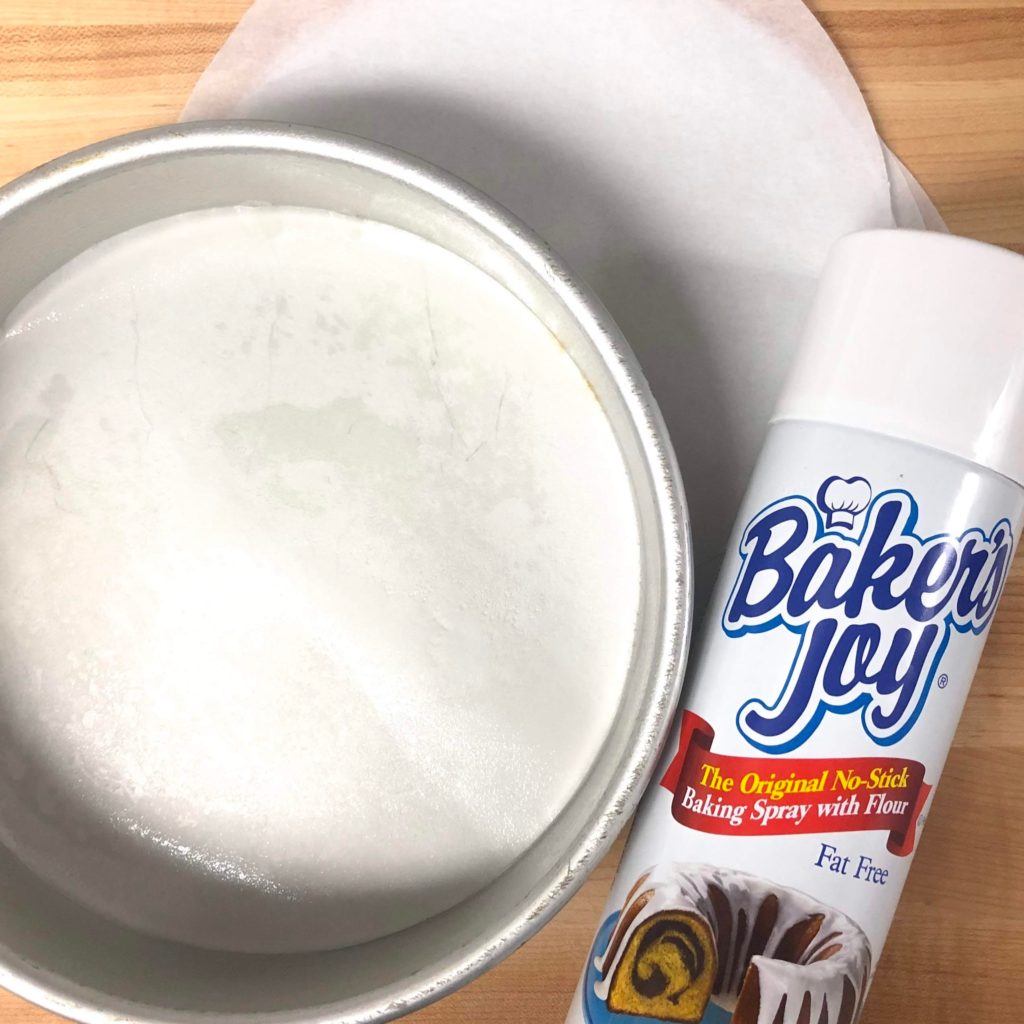 Cooking spray and parchment paper used for prepping cake pans before baking in our Cake Pan Showdown. 