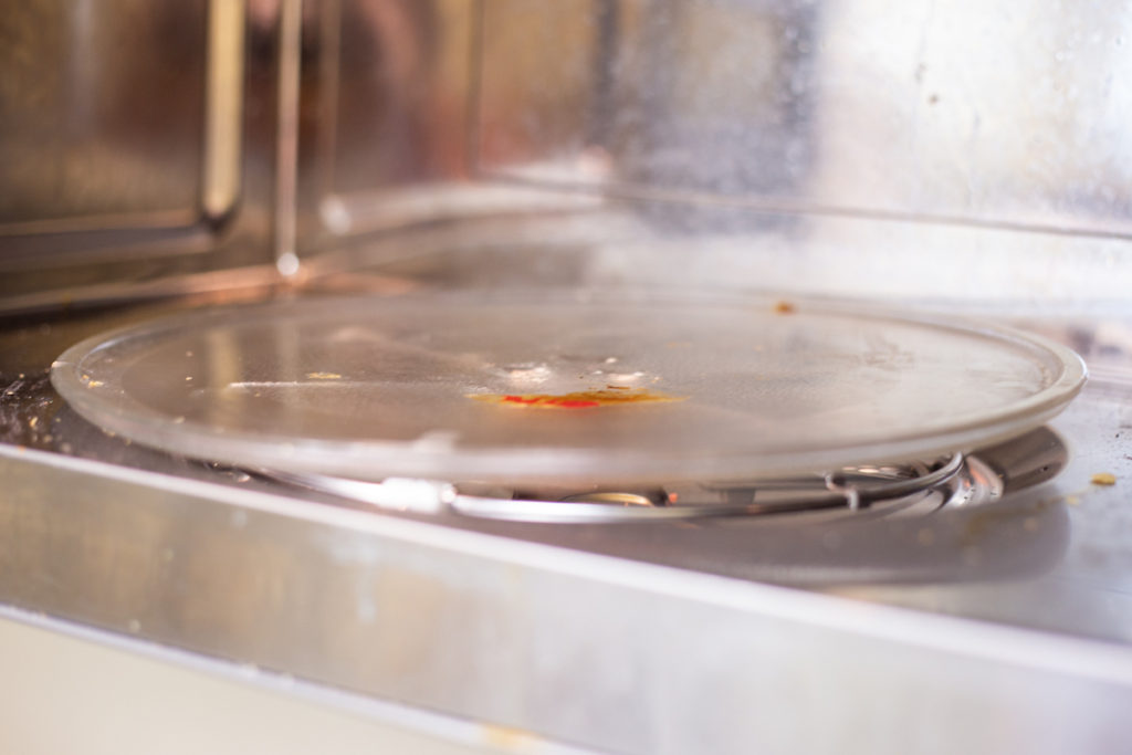 Dirty microwave glass tray