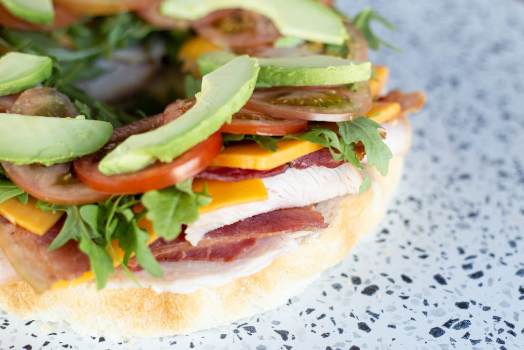 Sandwich toppings and sliced avocado