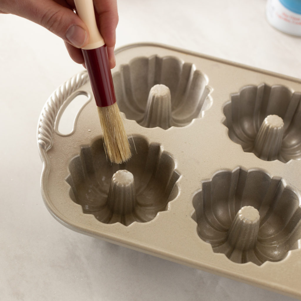 preparing a mini bundt pan 