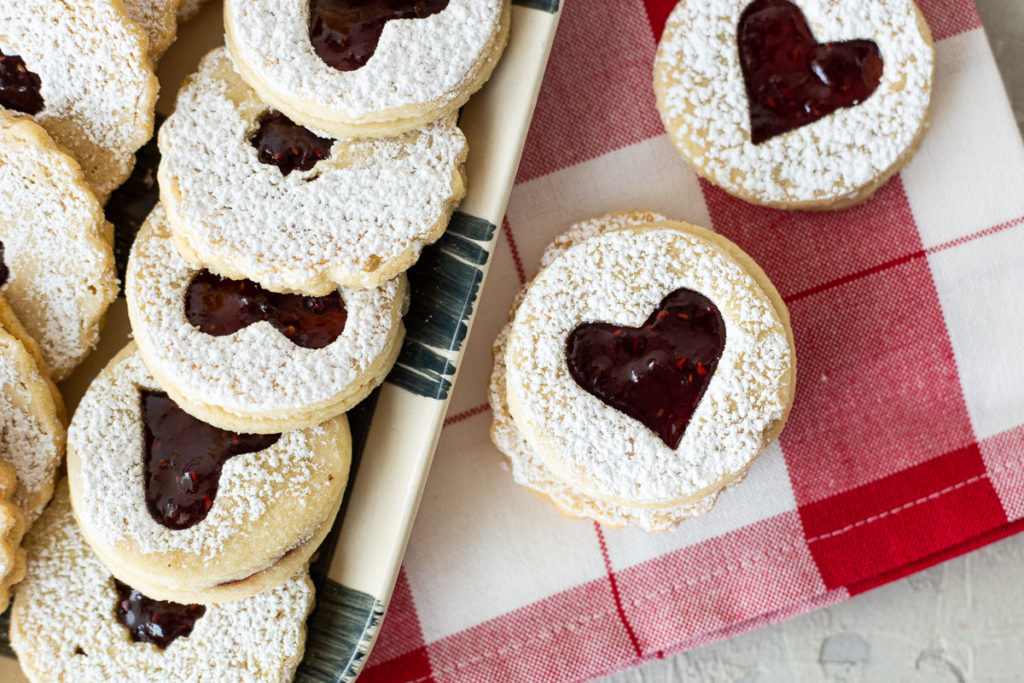 Raspberry jam-filled Linzer cookie close-up.