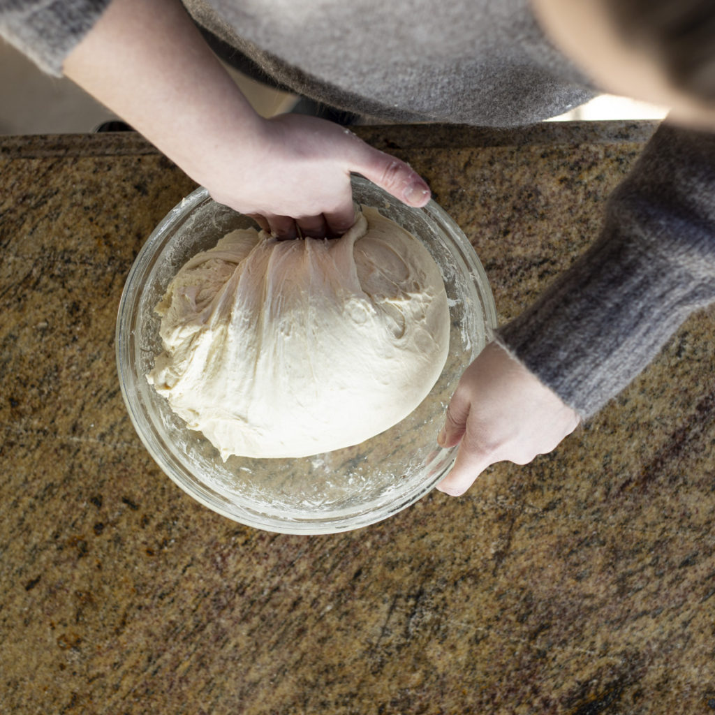 dough in a glass bowl