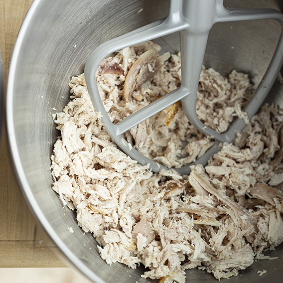 shredded chicken in a kitchenaid