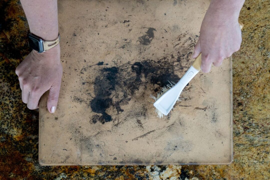 cleaning a pizza stone