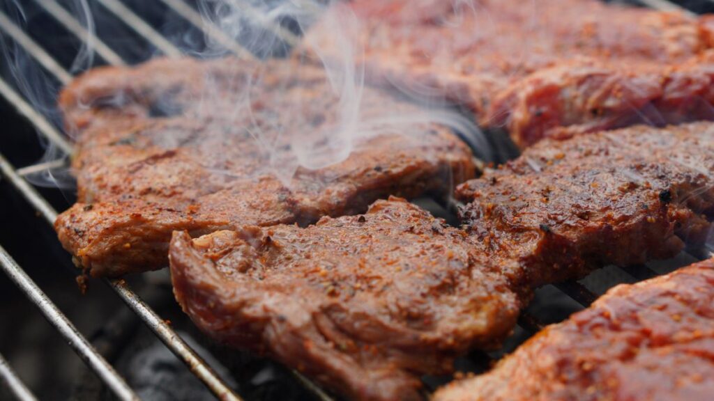 barbecuing meat