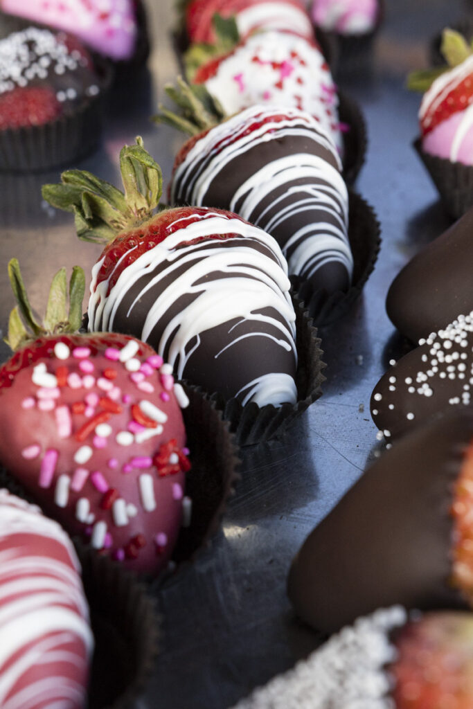 chocolate-dipped strawberries with white drizzle